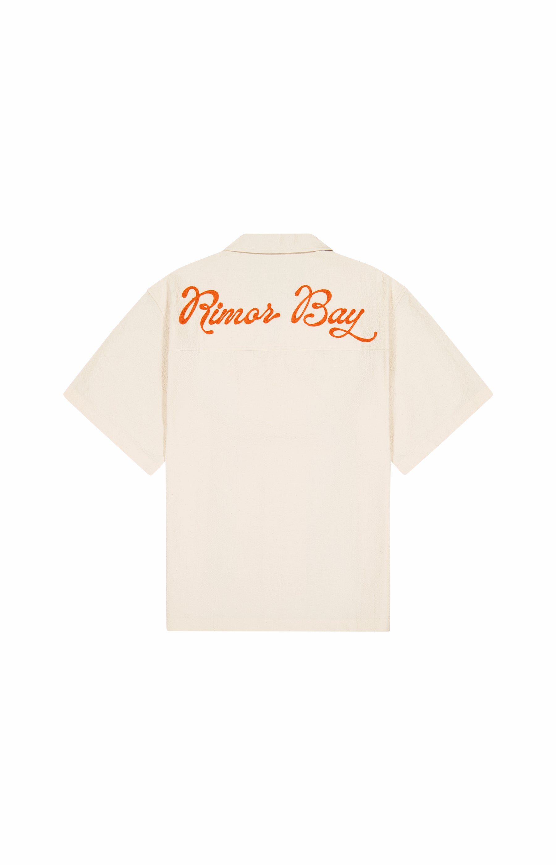 clearcut back of beige shirt with embroidered cursive logo
